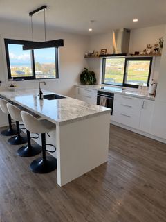 Kitchen island and floors — after