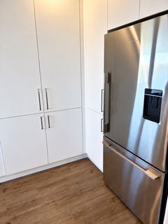 Fridge and cabinetry — after