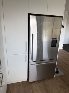Fridge and cabinetry — before